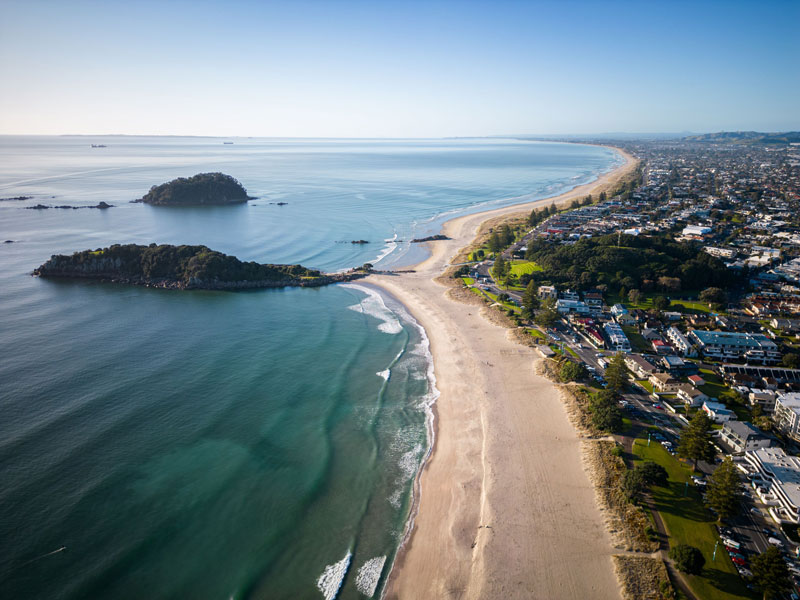 aerial-view-of-mount-maunganui-with-bay-of-plenty-2023-11-27-05-35-02-utc